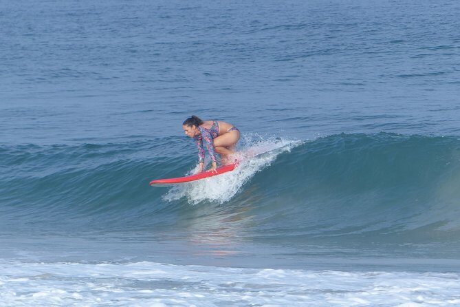 Professional Surfing lessons in the heart of Tel Aviv - In the Water: Catching Waves With Real-Time Coaching