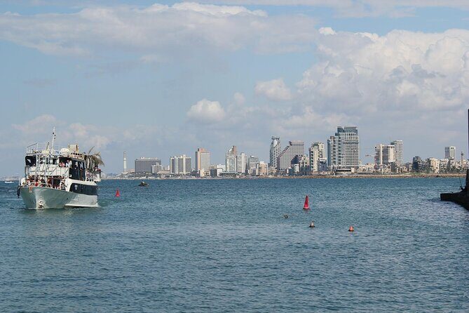 Tel Aviv; Jaffa Old City, Port & Shuk Hapishpishim Walking Tour - Jaffa Port finale: maritime history and the lighthouse symbol